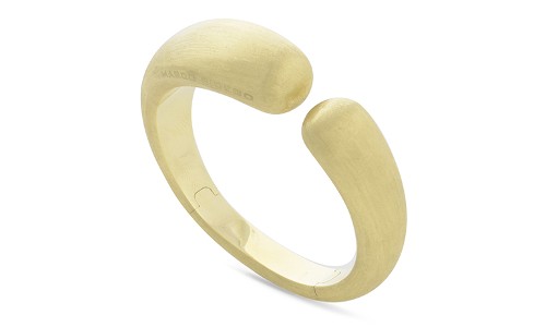 Thick gold cuffs with a round silhouette