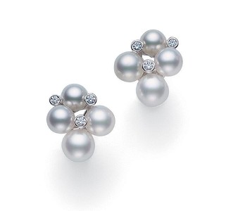 Cluster of multiple-sized silver-toned pearls with bezel set diamonds for an attractive stud earring design by Mikimoto