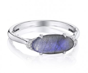 An oval labradorite stone horizontally set across a sterling silver band with diamonds along the sides by TACORI