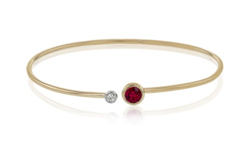 Gold bracelet with a ruby and diamond by Simon G.