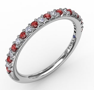 A Fana anniversary wedding band features rubies and diamonds