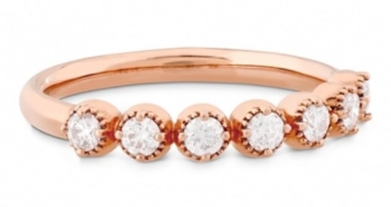 A rose gold anniversary wedding band with diamonds from Hearts On Fire