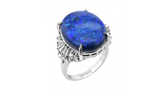 a white gold and blue opal fashion ring by Simon G.