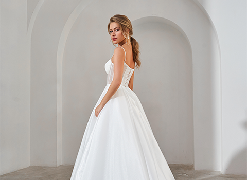 Bride standing in a white wedding dress Bride standing in a white wedding dress